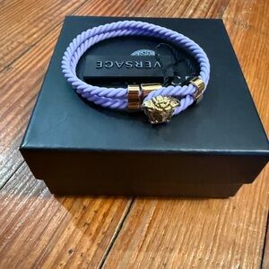 New in box authentic Versace bracelet purple with gold Medusa closure
